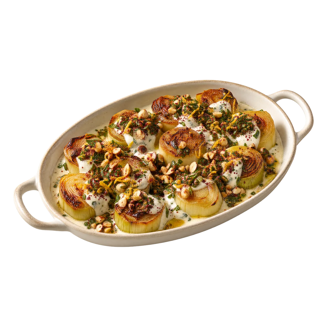 Pieczony por z pomarańczą, crème fraîche, orzechami laskowymi i sumakiem