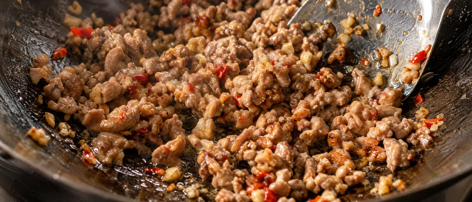 Fry the aromatics and meat