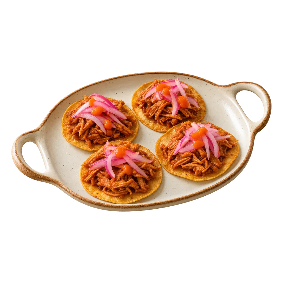 Cochinita pibil na mini tostadas