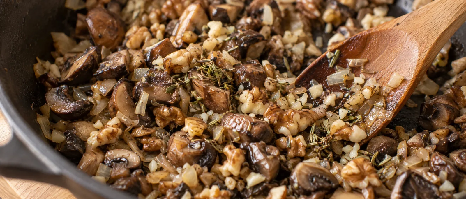 Add the walnuts and aromatics