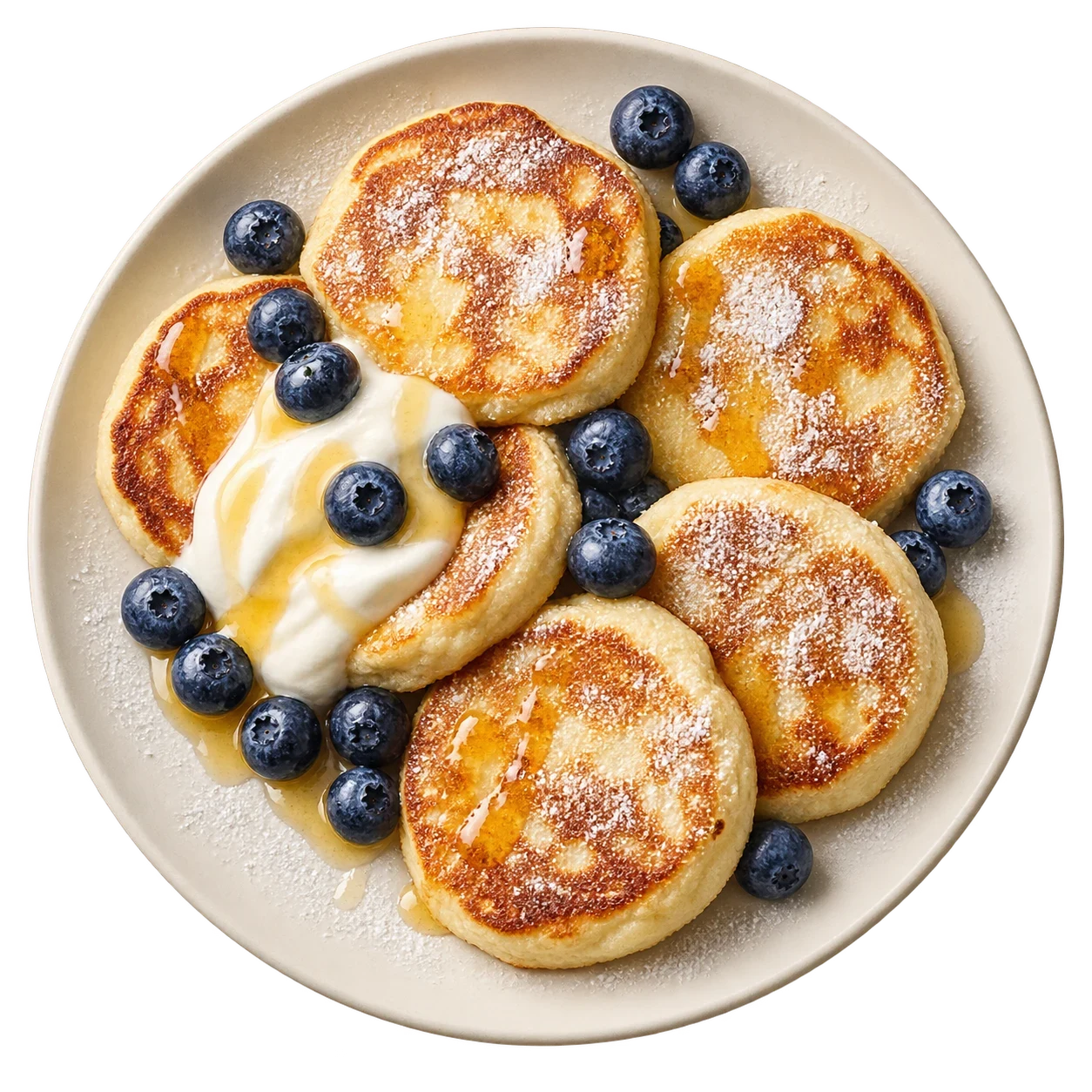 golden ricotta pancakes with berries